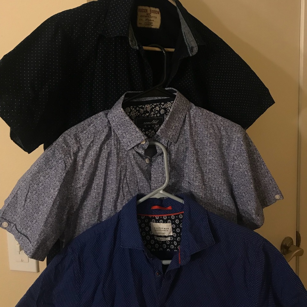 Three assorted button down short sleeve shirts